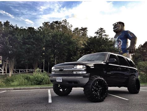 Squated tahoe | Lifted chevy tahoe, Lifted chevy trucks, Jacked up trucks