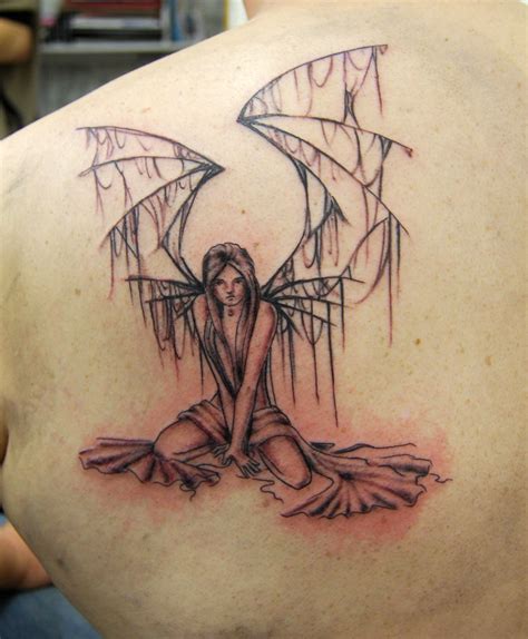 angel with broken wings tattoo | Tattooed by Johnny at; The … | Flickr