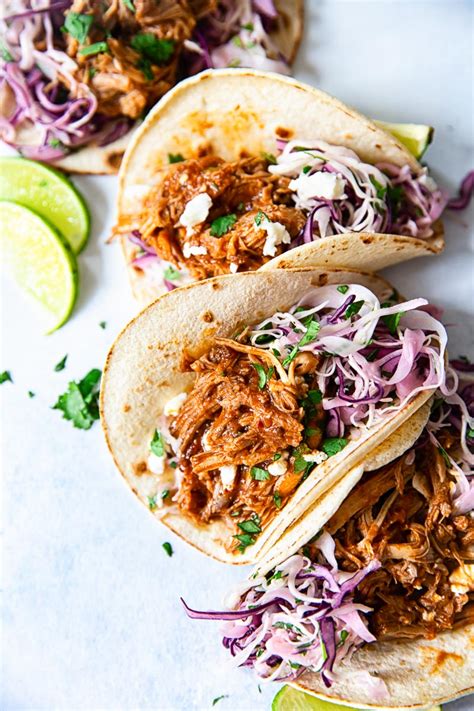 Slow Cooker Pulled Pork Tacos with Cilantro Lime Slaw