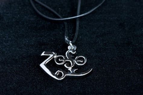 Led Zeppelin Jimmy Page Zoso Symbol Pendant by CandyStoreRockGifts