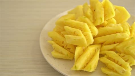 Fresh pineapple slices 3096557 Stock Video at Vecteezy