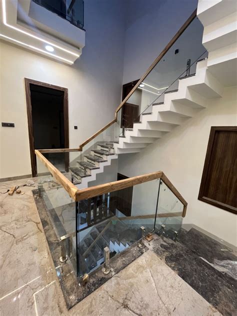 Glass hand railing | Glass handrail, Steel railing design, Home stairs ...