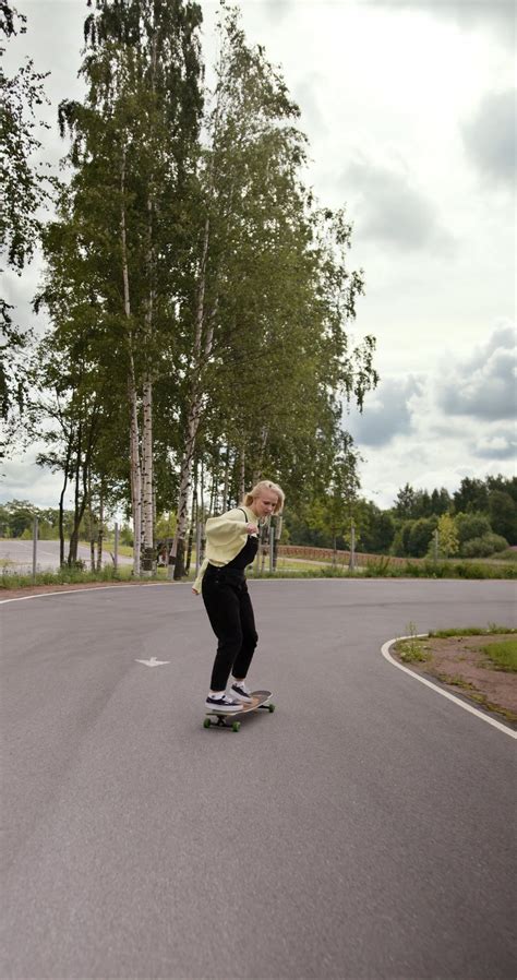 Girl Doing Tricks on a Longboard · Free Stock Video