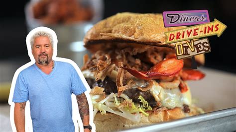 Guy Fieri Eats a Surf 'n' Turf Burger | Diners, Drive-Ins and Dives ...