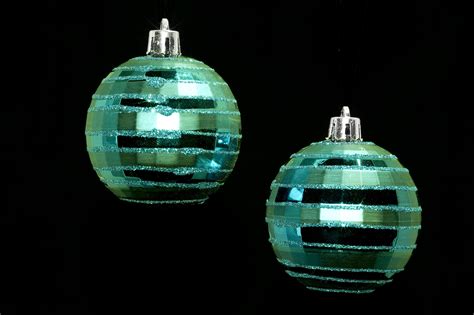 Photo of metallic green christmas baubles | Free christmas images