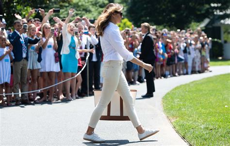 Melania Trump rocks casual khakis, white sneakers and $1,000 handbag ...