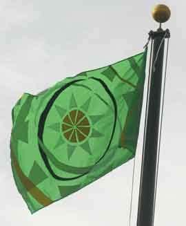 OECS flag raised for first time - Searchlight