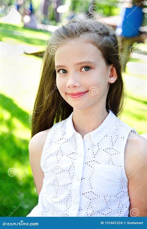 Portrait Of A Little Adorable Little Girl Smiling In