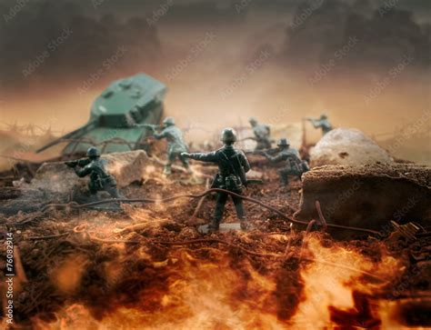 Toy soldiers on battlefield attacking diorama scene. Stock Photo ...