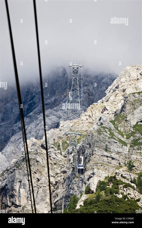 Austria, Zugspitze, View of cable car and mountain Stock Photo - Alamy