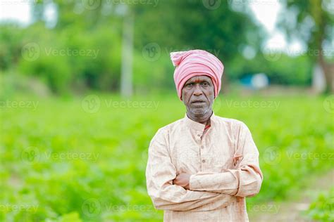 Indian farmer Holding gullak in hand, saving concept, happy poor farmer ...