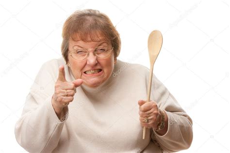 Upset Senior Woman with The Wooden Spoon Isolate Stock Photo by ...