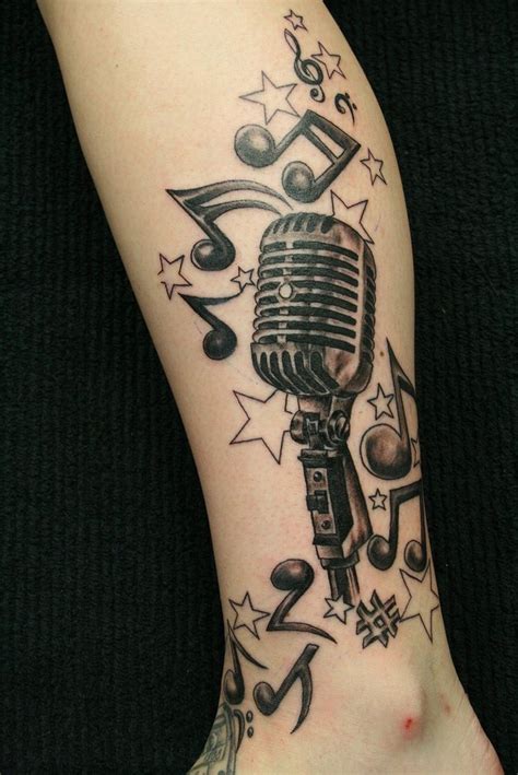 Beautiful Girls Music Tattoo Design on Leg for 2011 - YusraBlog.com