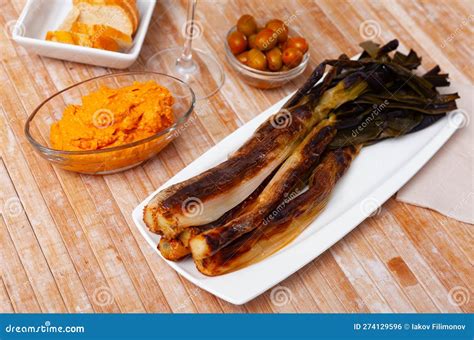 A Traditional Catalan Dish of Charred Calcot Onion and Romesco Sauce ...