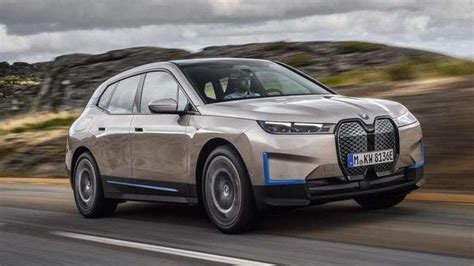 BMW unveils iX SUV, its electric flagship set to challenge might of ...