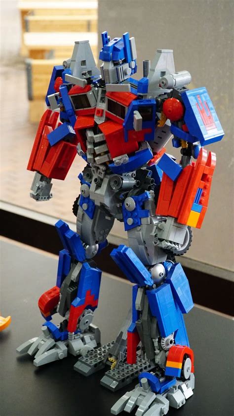 Optimus | Lego transformers, Lego custom minifigures, Lego dinosaur