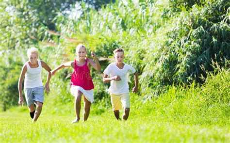 Kids playing active games stock image. Image of child - 210659891