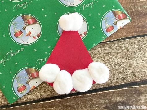 Easy Paper Plate Santa Hat Craft • The Simple Parent