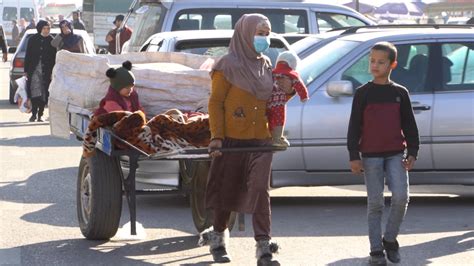 With Four Kids By Her Side, A Tajik Mother Collects Trash To Make ...