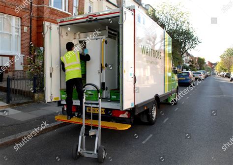 Waitrose Home Delivery Worker Sorts Through Editorial Stock Photo ...