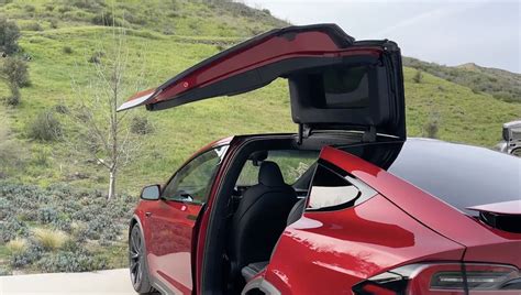 Tesla shares old footage of Model S with Falcon wing prototype doors