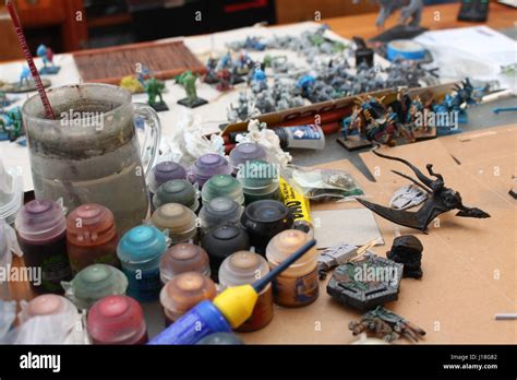 Painting Warhammer lizardmen figures Stock Photo - Alamy