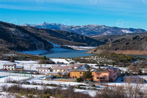 snowy mountain landscape with lake and village 6933040 Stock Photo at ...