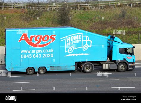 Argos Home Delivery advert on side of articulated trailer and lorry ...