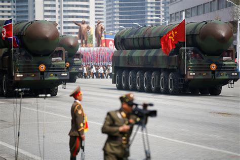 North Korea rolls out new missiles during huge military parade - CBS News