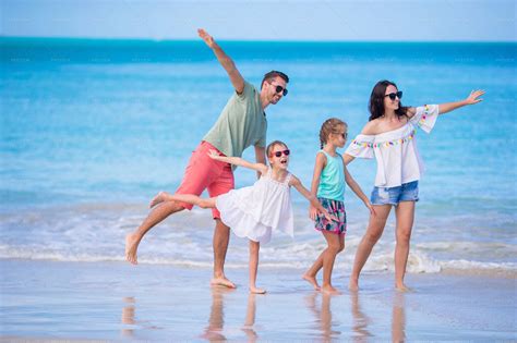 Happy Family On Beach - Stock Photos | Motion Array