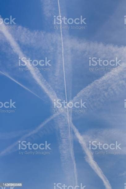 Chem Or Vapor Trails After A Jet Liner Stock Photo - Download Image Now ...