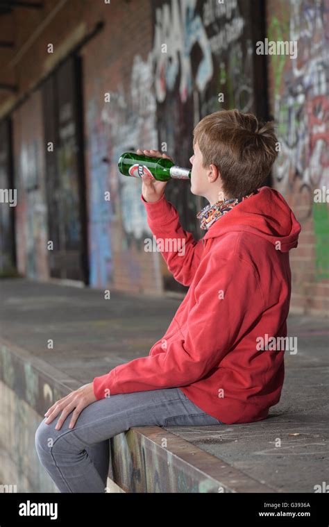 young person drinking beer Stock Photo - Alamy