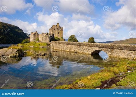 Eilean Donan Castle and Bridge from Scenic Lookout Scotland, Cloudy Sky ...