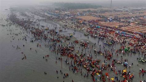 Devotees including Naga Sadhus gather to take holy dip during ...