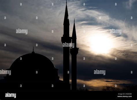 Mosque silhouette in a magnificent sunset view Stock Photo - Alamy