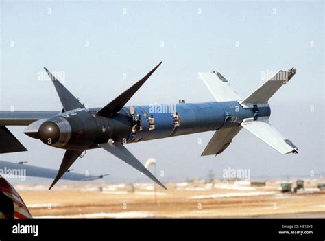 A close-up view of an AIM-9L Sidewinder training missile mounted on the ...