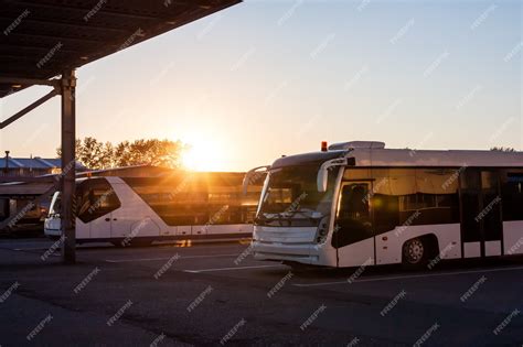 Premium Photo | Shuttle buses at the parking lot of the airport in the ...