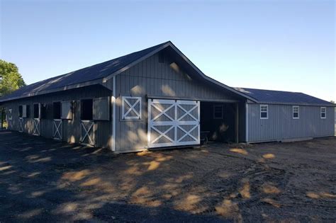 Horse Barn Designs: Center Aisle Barn vs Shed Row Barn | J&N Blog