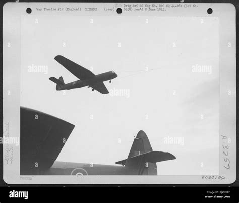 A British Horsa Glider Is Shown Being Towed Over The Airfield At Berks ...