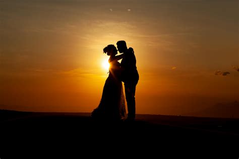 Silhouette of Couple Kissing during Sunset · Free Stock Photo