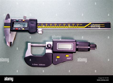 Digital caliper and a digital micrometer Stock Photo - Alamy