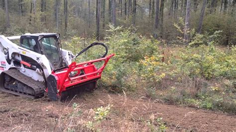 Bobcat T770 Skid steer with AHWI forestry mulcher | Doovi