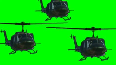 HUEY HELICOPTERS COMING DOWN TO LANDING ZONE-with Sound-- green screen ...