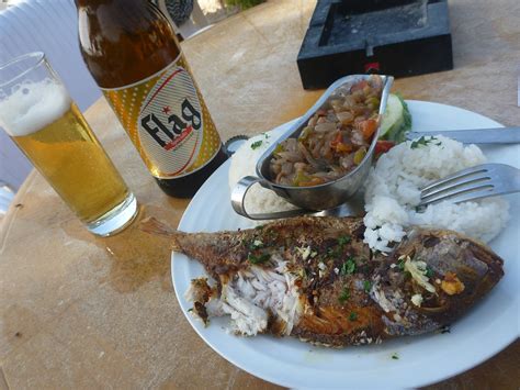 Friday's Featured Food: Barbecued Fish and Flag Beer on N'Gor Beach ...