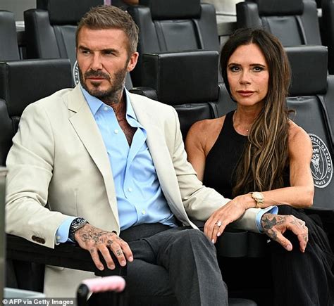 Victoria Beckham lovingly holds onto husband David as they be a part of ...