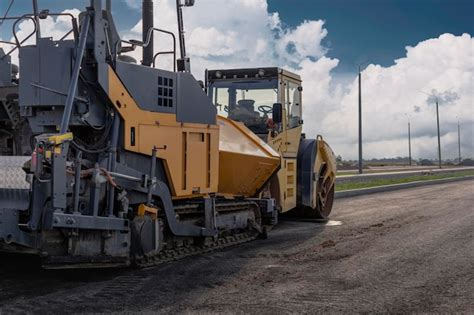 Premium Photo | Asphalt paving equipment. asphalt paver and heavy ...