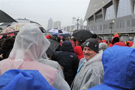 See Alabama, Georgia fans brave the rain before College Football ...