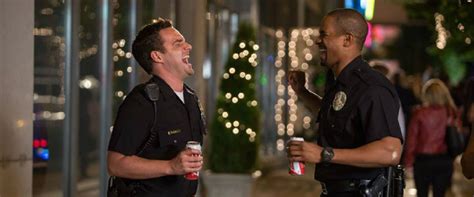 Let's Be Cops movie review & film summary (2014) | Roger Ebert