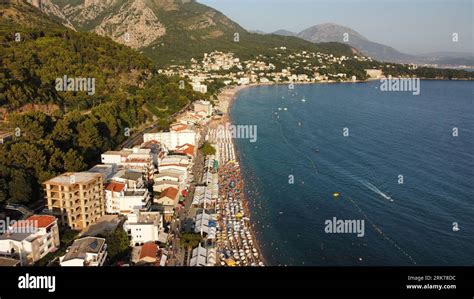 Aerial view of Sutomore, a coastal town nestled between rolling hills ...