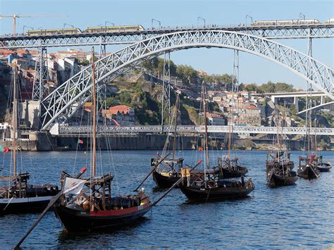 Porto Bridge with Metro and Wine Ships Photograph by Richard Boot ...